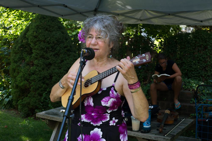Denya playing her Ukulele
